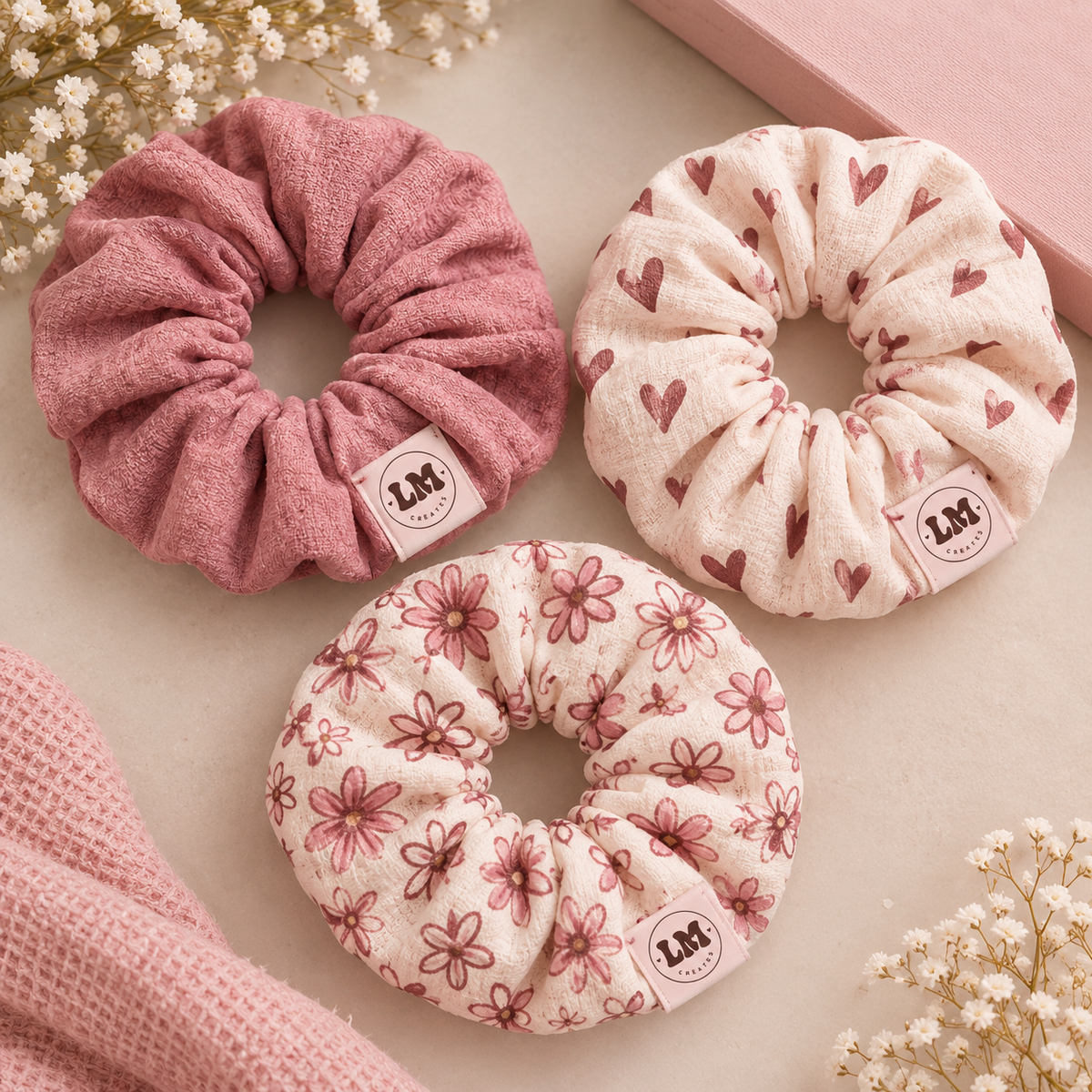 Soft Orchid Pack – three LM Creations scrunchies in dusty rose, heart print, and daisy floral